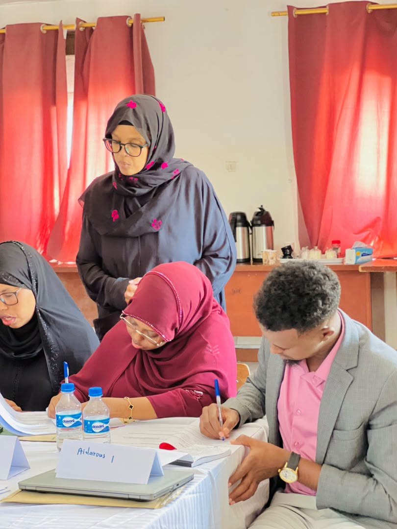 A facilitator guides participants through a workshop exercise